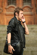 Young guy talking by cellphone