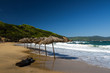 Straw umbrellas on a beach
