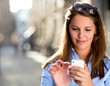 Woman sending a text message