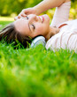 Woman with headphones at the park