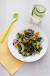 Salad with onion, watercress, avocado and oranges top view