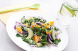 Watercress salad with onions, oranges and avocado