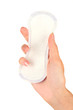 woman's hand holding a daily sanitary pad