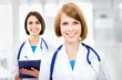 Portrait of two successful female doctors