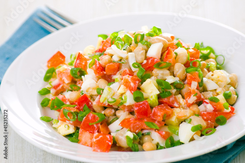 Photo: fresh vegetable salad with white beans, red pepper, tomato, egg fresh vegetable salad with white beans, red pepper, tomato, egg