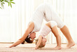 Foto: Mother and daughter doind exercise Mother and daughter doind exercise