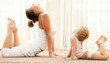 Mother and daughter doind exercise
