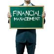 Business man holding blackboard on the background , Financial