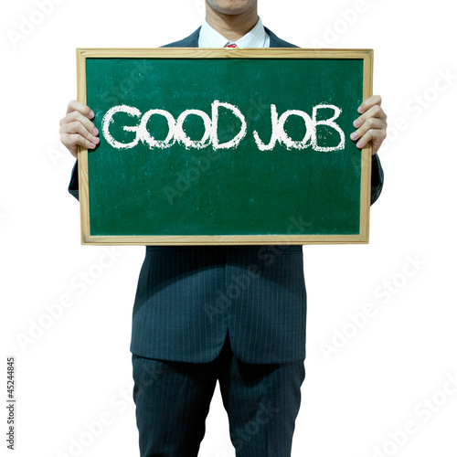 Photo: Business man holding blackboard on the background , Good job Business man holding blackboard on the background , Good job