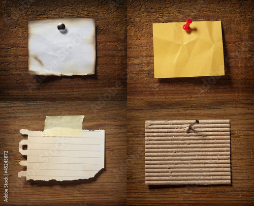 Photo: note paper on wooden wall blank note paper on wooden wall blank