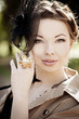 Photo: Woman in a retro style in the city Woman in a retro style in the city