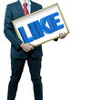 Business man with bulb head holding sign in the white board