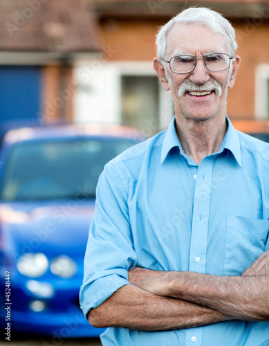 Photo: Senior man with car Senior man with car