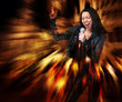 Rock star. Sexy woman singing.