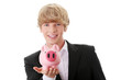 Young businessman holding piggy bank