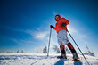 Hiker in winter mountains snowshoeing
