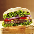 Cheeseburger with lettuce tomato and onion