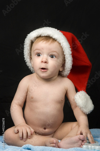 Photo: small baby with santa hat small baby with santa hat