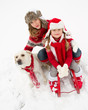 Winter fun , snow, sledding with dog at winter time