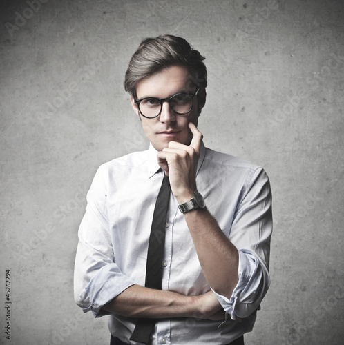 Photo: Thoughtful Young Businessman Thoughtful Young Businessman