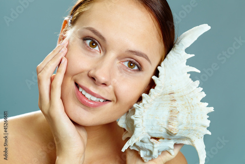 Photo: Girl with shell Girl with shell