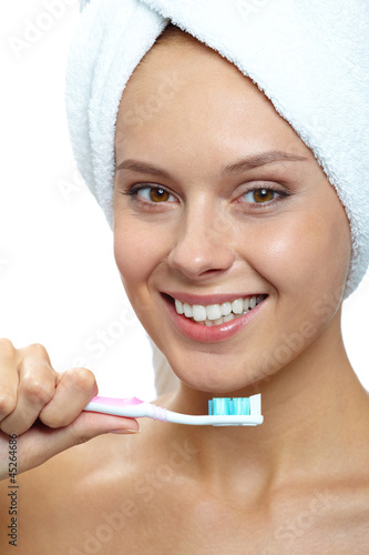 Photo: Female with toothbrush Female with toothbrush