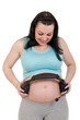 Pregnant belly with headphones