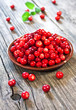 fresh red berries on wooden table