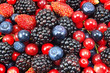 different fresh berries as background