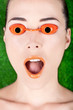Photo: Closeup of a beautiful woman wearing tanning bed glasses with mo Closeup of a beautiful woman wearing tanning bed glasses with mo