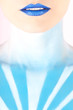 Photo: Artistic woman painted with blue representing the sky Artistic woman painted with blue representing the sky