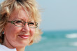 Photo: happy senior woman on summer vacation at sea happy senior woman on summer vacation at sea