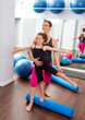 Aerobics woman personal trainer of children girl