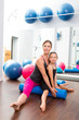 Aerobics woman personal trainer of children girl