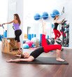 Aerobics pilates gym women group and crosstrainer