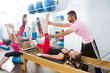 Pilates aerobic personal trainer man in cadillac
