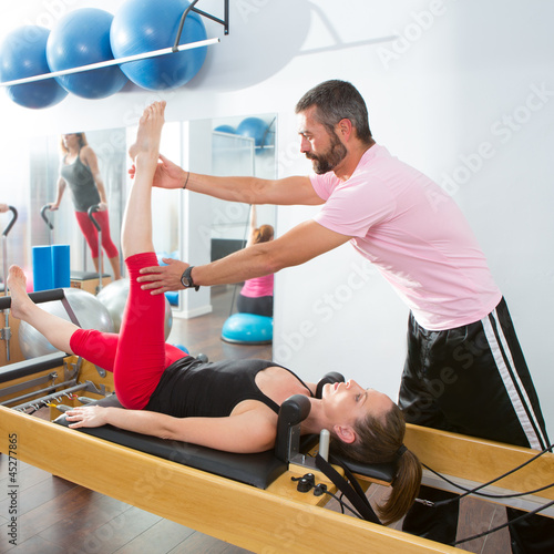 Photo: Pilates aerobic personal trainer man in cadillac Pilates aerobic personal trainer man in cadillac