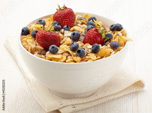 Photo: Bowl of healthy muesli and fresh berries Bowl of healthy muesli and fresh berries