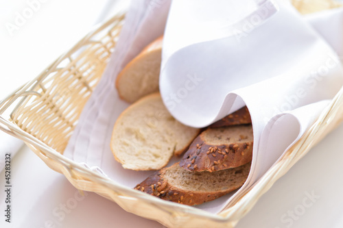 Photo: slices of bread in a wicker basket slices of bread in a wicker basket