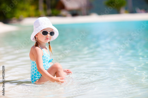 Photo: Little girl at beach Little girl at beach