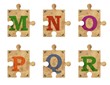 Old grunge cardboard jigsaw puzzle pieces with alphabet, Part 3