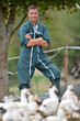 Duck breeder standing outside the farm