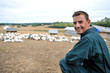 Duck breeder standing outside the farm