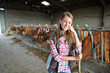 Portrait of woman working in barn
