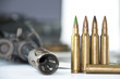 Foto: Close up of rifle and bullets on white background Close up of rifle and bullets on white background