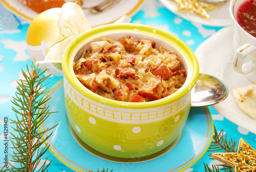 Photo: bowl of sauerkraut (bigos) with sausage for christmas bowl of sauerkraut (bigos) with sausage for christmas