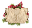 Photo: Old parchment paper with copy space on Christmas tree branch bac Old parchment paper with copy space on Christmas tree branch bac