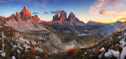 Photo: Sunset mountain panorama in Italy Dolomites - Tre Cime Sunset mountain panorama in Italy Dolomites - Tre Cime