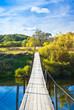 Wire bridge. Protva river. Kaluga region. Russia
