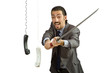 Angry businessman cutting the phone cable